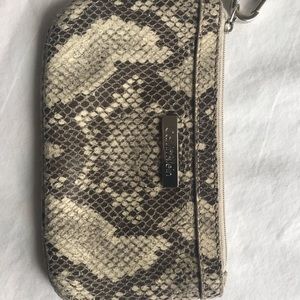 Calvin Klein wristlet, faux leather. Snake skin